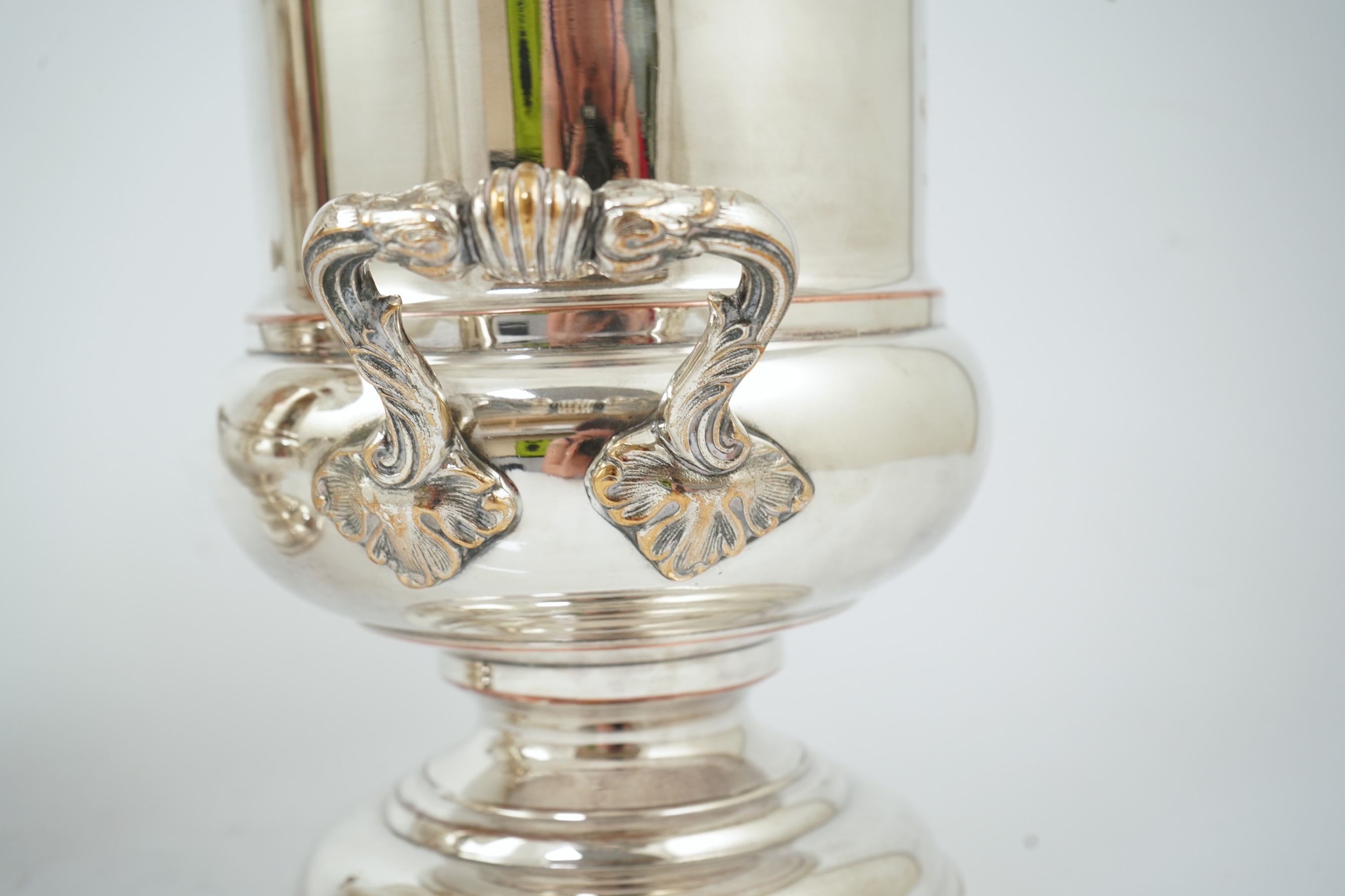 A pair of late 19th/early 20th century silver plated two handled campana shaped wine coolers, makers, FH